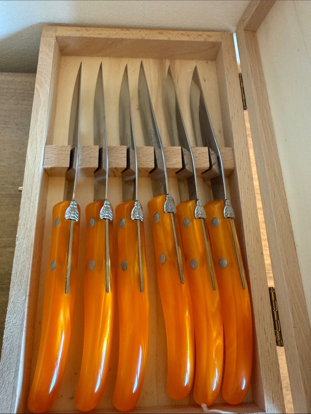 Claude Dozorme Laguiole Orange Lucite Steak Knives. Set of 6